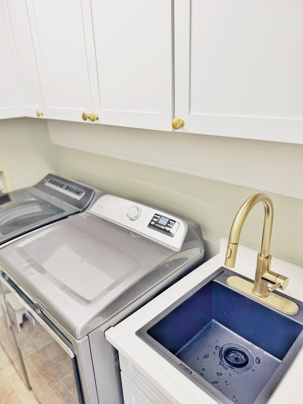 Custom laundry room cabinetry and finish work