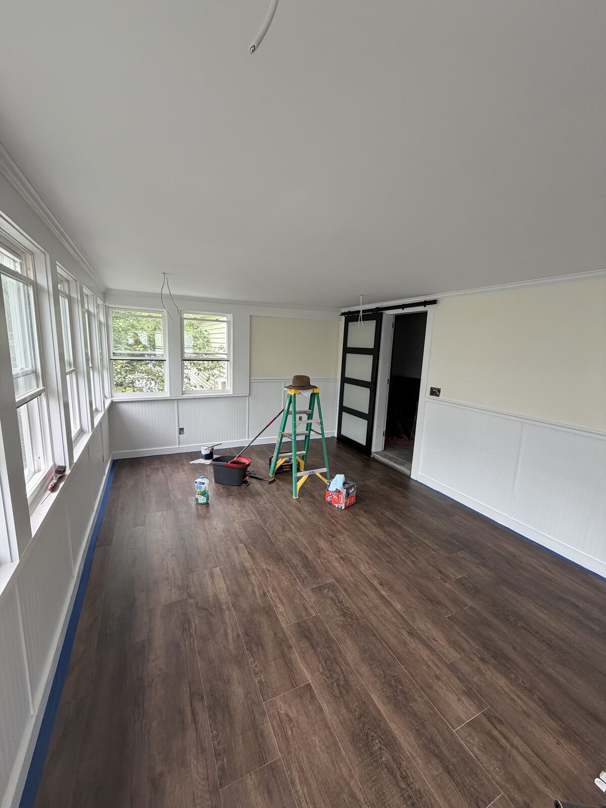 Same room with new flooring and finished walls
